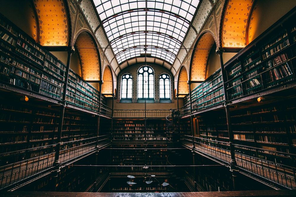 A beautiful old library with two floors of books and vaulted ceilings.


Rijksmuseum, Amsterdam, Netherlands. Photo by Will van Wingerden on Unsplash.