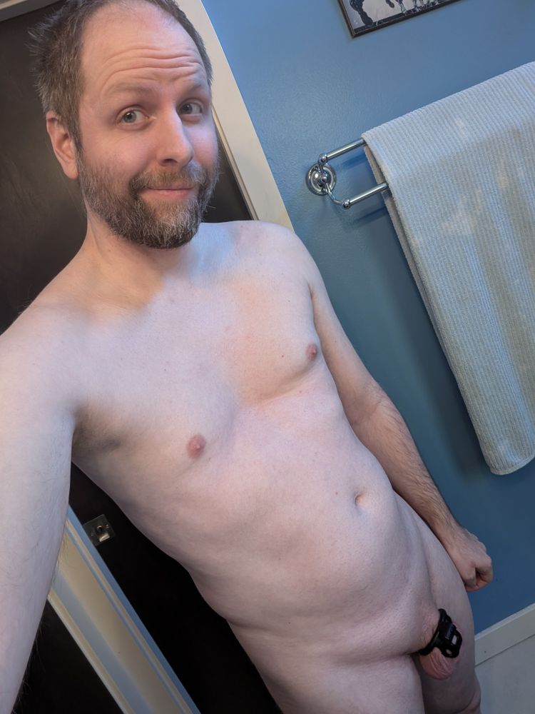 Bramble in the nude, cock locked away in a tiny nub cage