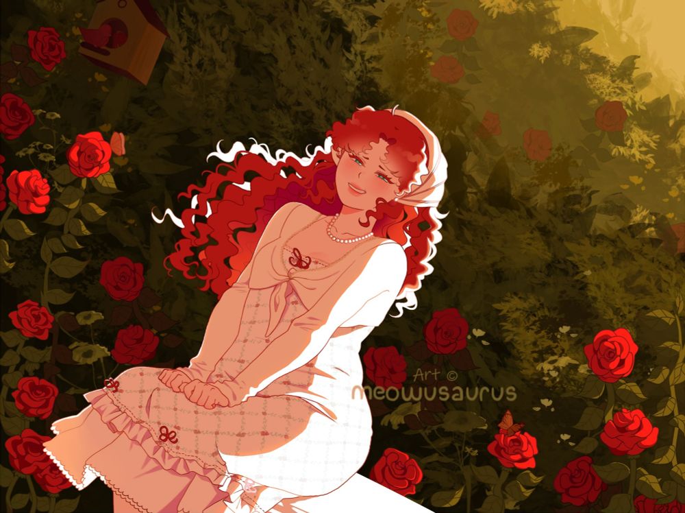 Young woman with red, curly hair is sitting down. The background includes bushes and red roses.