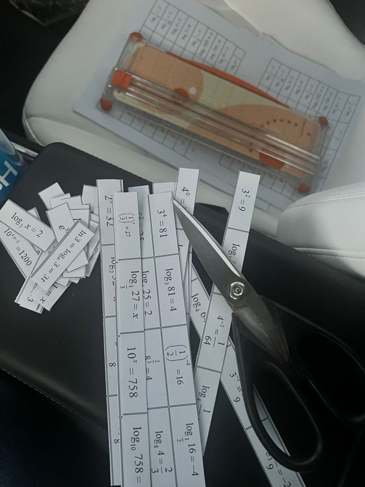 Strips of paper with log and exponential problems incompletely cut as a preparation for a card sort discovery activity. All in a car. 