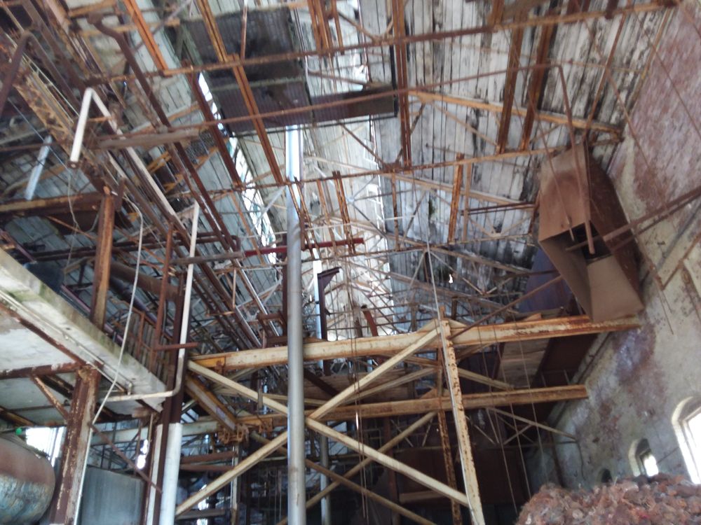 Interior of rusty abandoned industrial building 