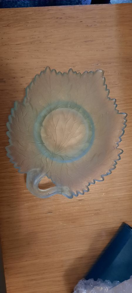 The same peice of "blue uranium glass" under normal light, with a slight frosty blue tint you wouldn't know it reacts to UV 