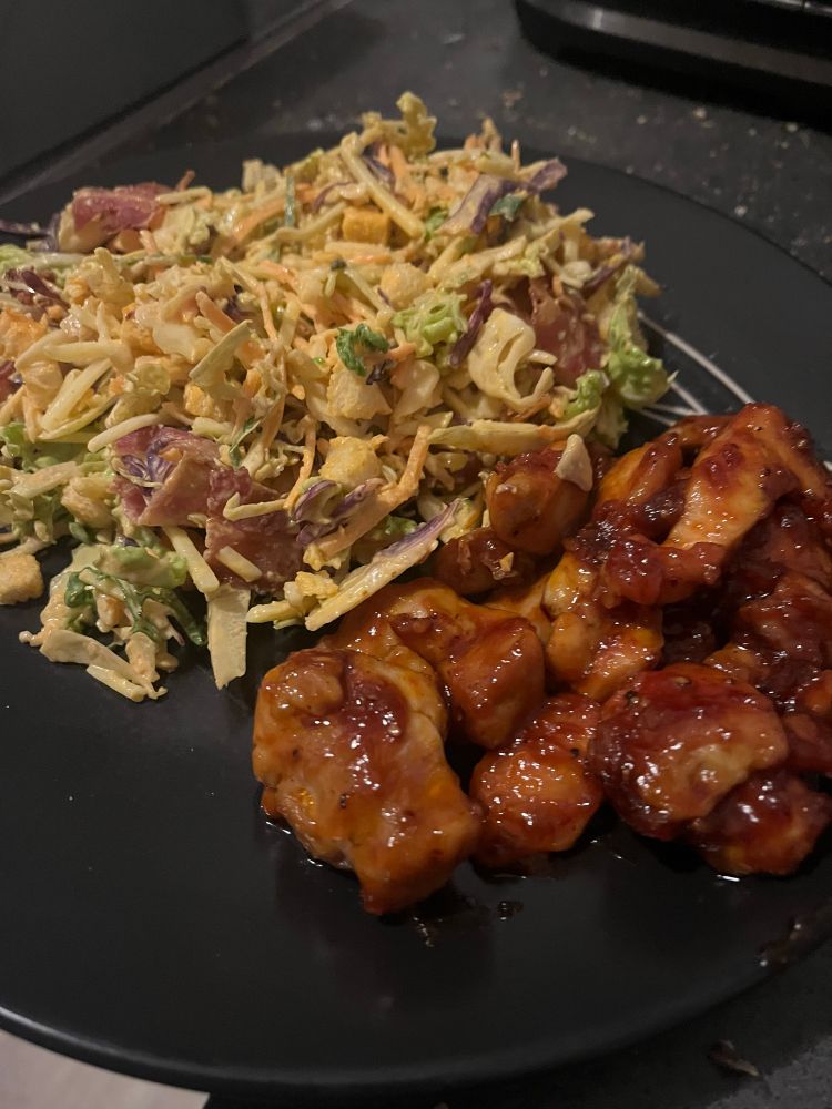 The meal described above! Sweet chili chicken is in the foreground, with the salad in the background. 