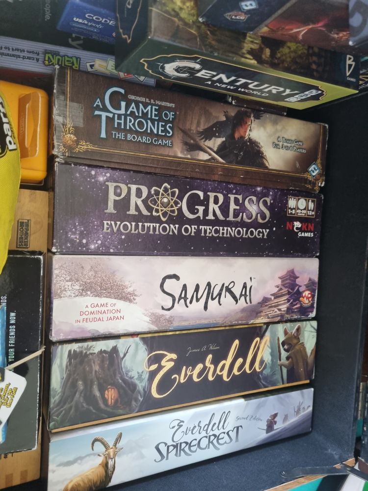 Games inside the box: game of thrones, progress evolution of technology, samurai, everdell, everdell spirecrest 