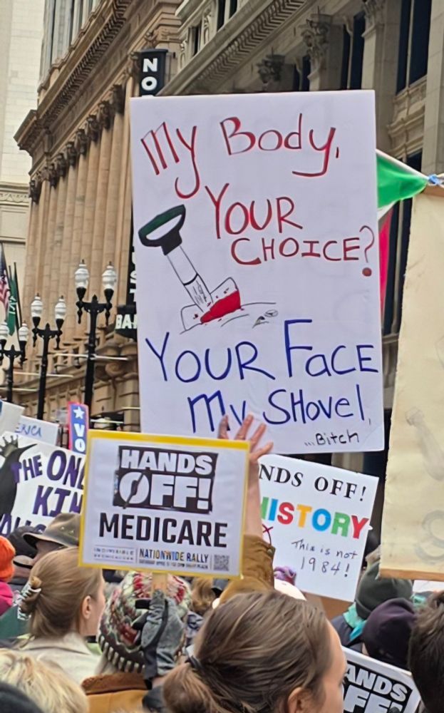 Sign that says 'My Body, Your Choice? Your Face, My Shovel.'