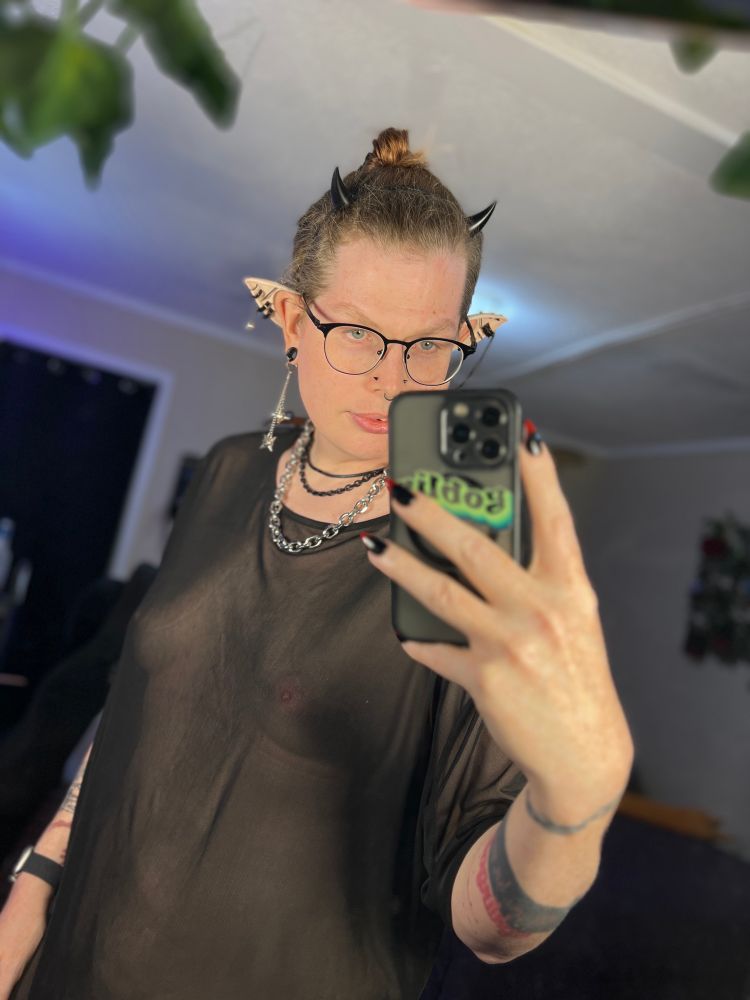 Elf wearing just a shear top