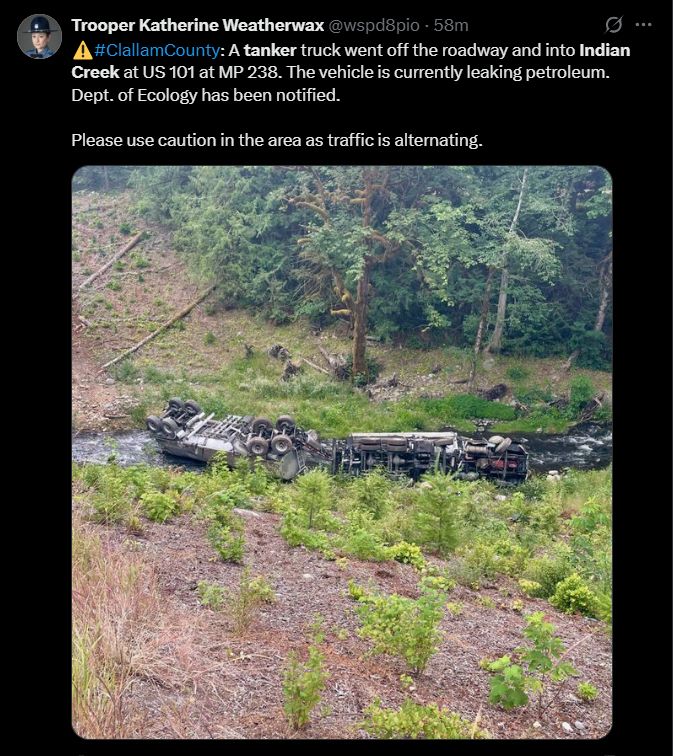 A screenshot of WSP's social media post showing an overturned tanker truck lying on its side in Indian Creek.