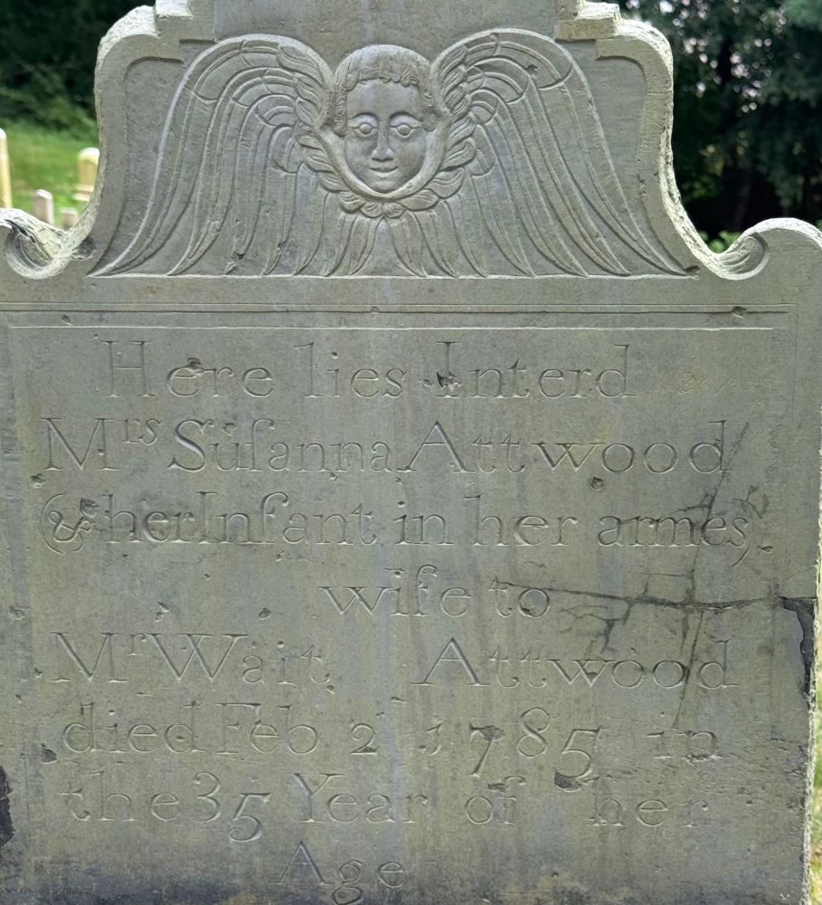 Grave marker at Burial Hill Cemetery Plymouth MA. “Mrs Susanna Atwood with infant in arms” Dated 1785