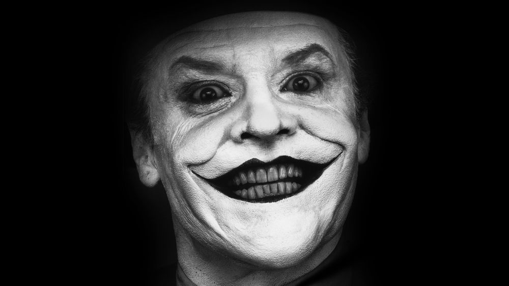 Jack Nicholson insane facial expression as Joker from Batman movie.