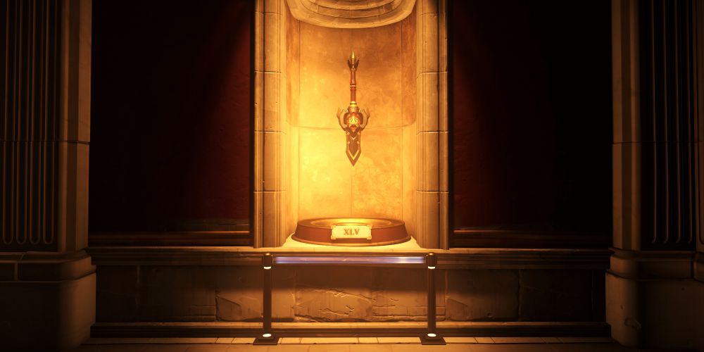 A sword weapon thingy on display in the new Colosseum Arena map for Overwatch Stadium. XLV, the roman numeral for 45 is underneath it. 