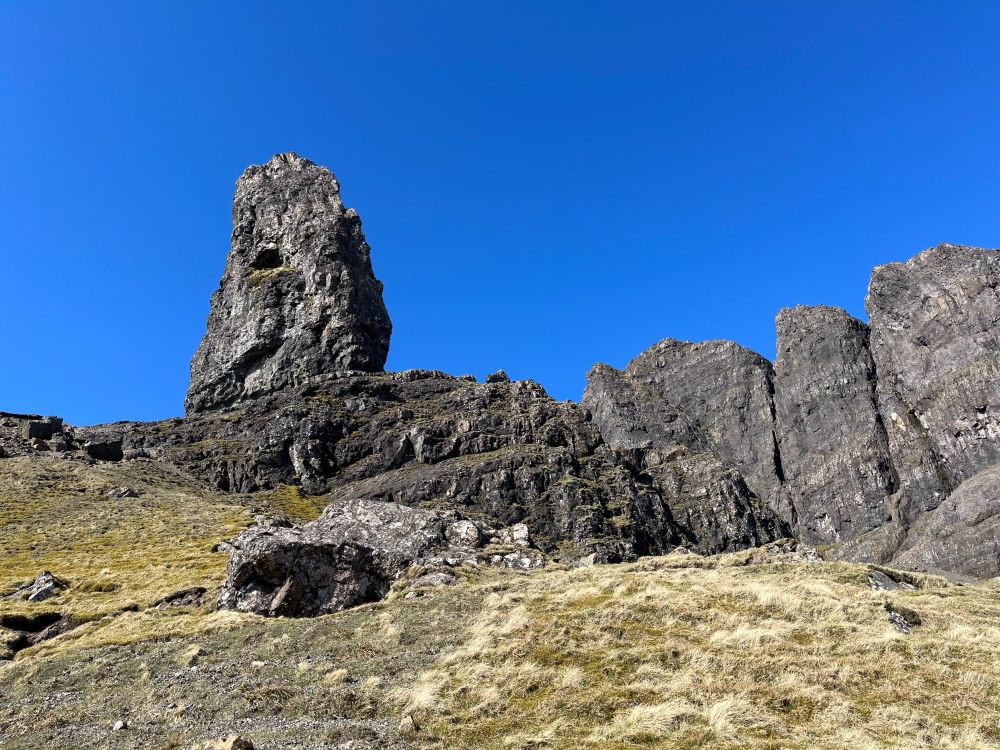 Old Man of Storr Rock in front of a blue sky