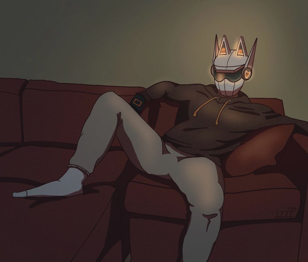 A bot lounges on a red couch in the dark. They are wearing a brown hoodie and grey sweats with white socks and a white helmet whose screen glows in the dark