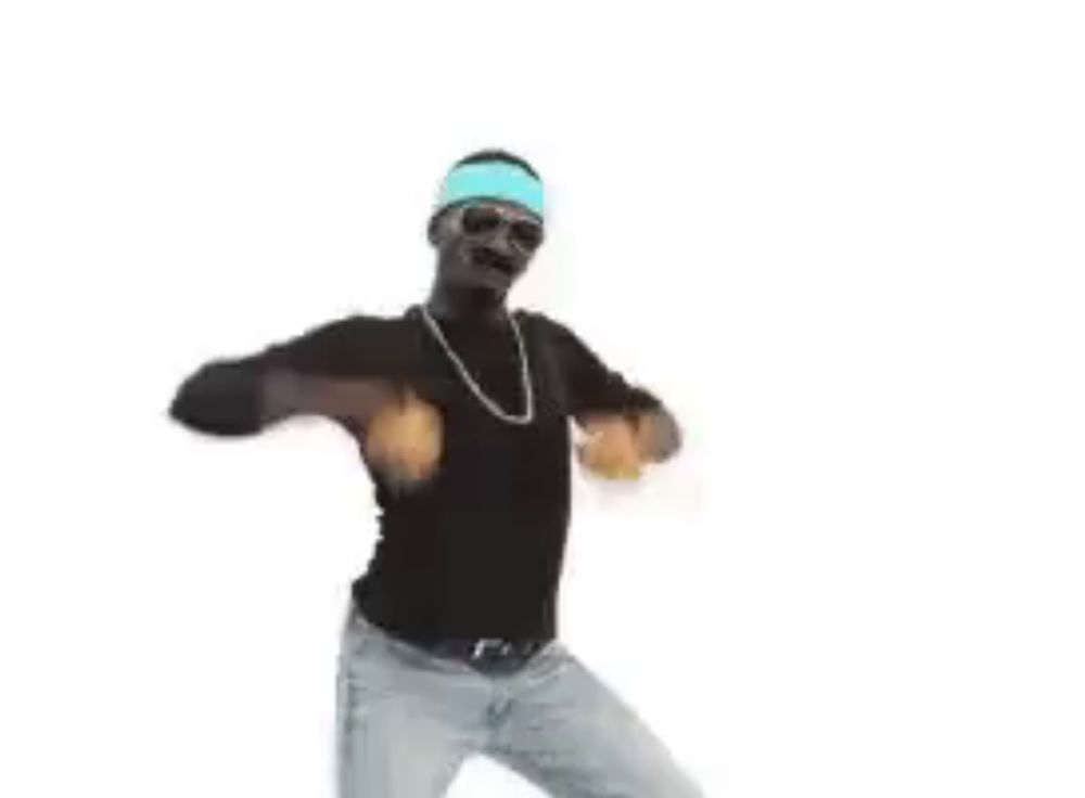 a man wearing sunglasses , a headband and a necklace is dancing .