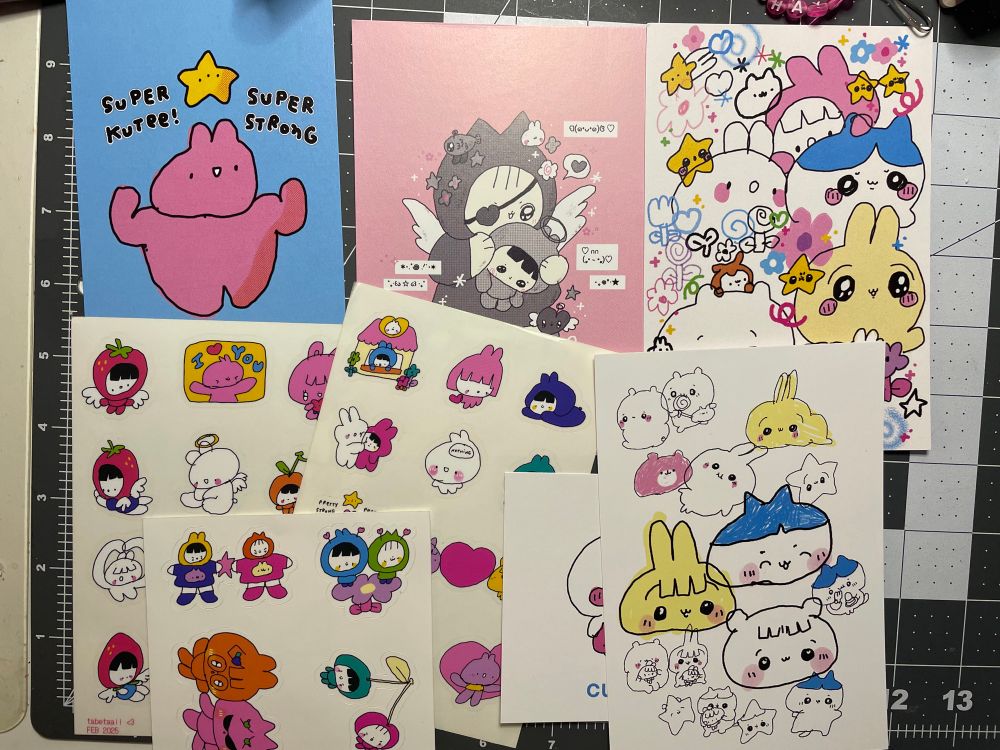 various cute stickers and art prints including chiikawa