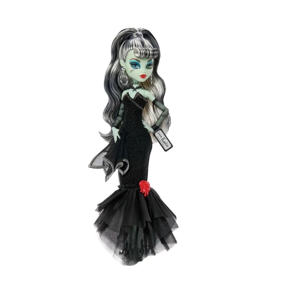 the same doll in a long black dress