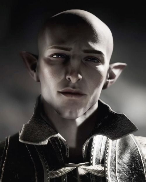 Screenshot from Dragon Age Veilguard of Solas in the Fade looking at the camera and gently smiling
