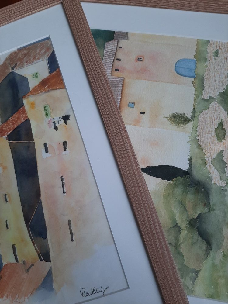 Zwei Aquarelle mit Häusern in gedeckten Farben.