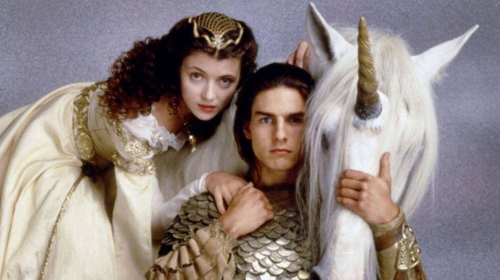 Tom Cruise, Mia Sara, and a unicorn in a publicity shot for Ridley Scott’s LEGEND