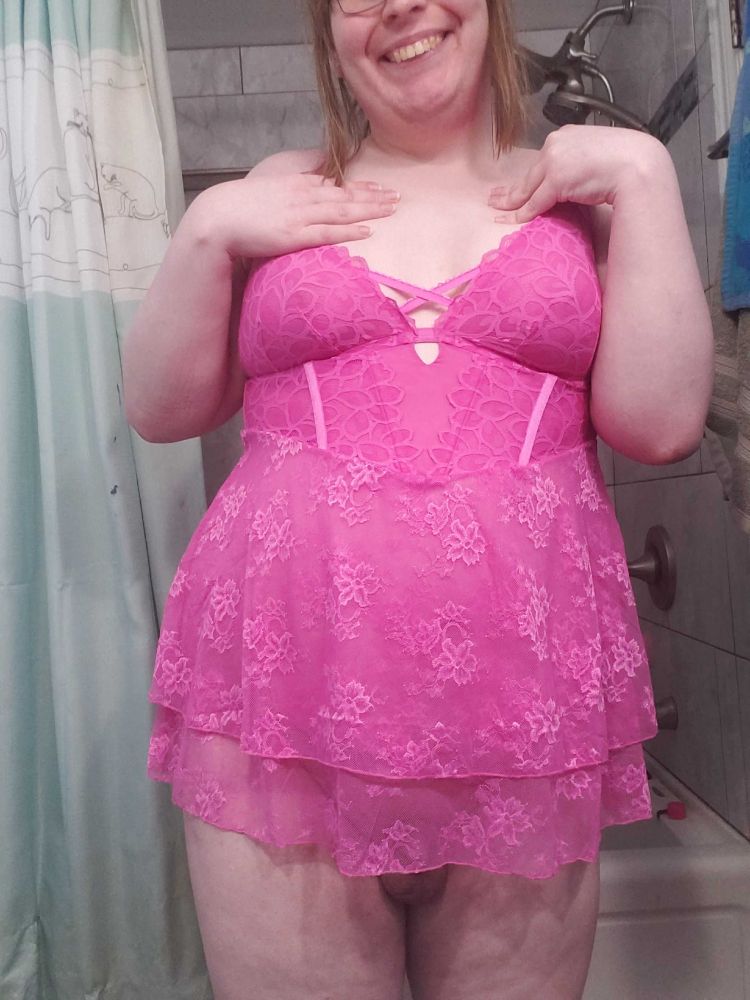 Me a chubby white trans gal showing off a pink babydoll from the front