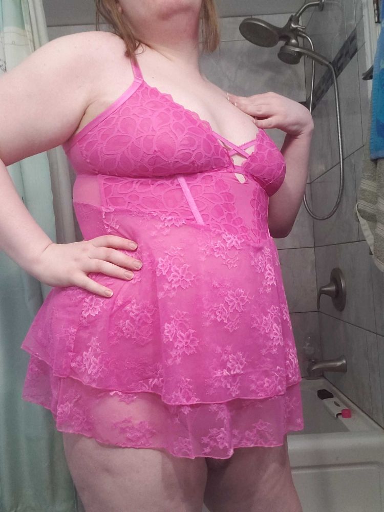Me a chubby white trans gal showing off a pink babydoll from the front