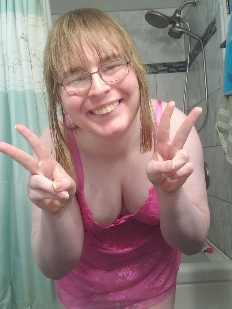 Me a chubby white trans girl bending over to show off my cleavage in a pink babydoll