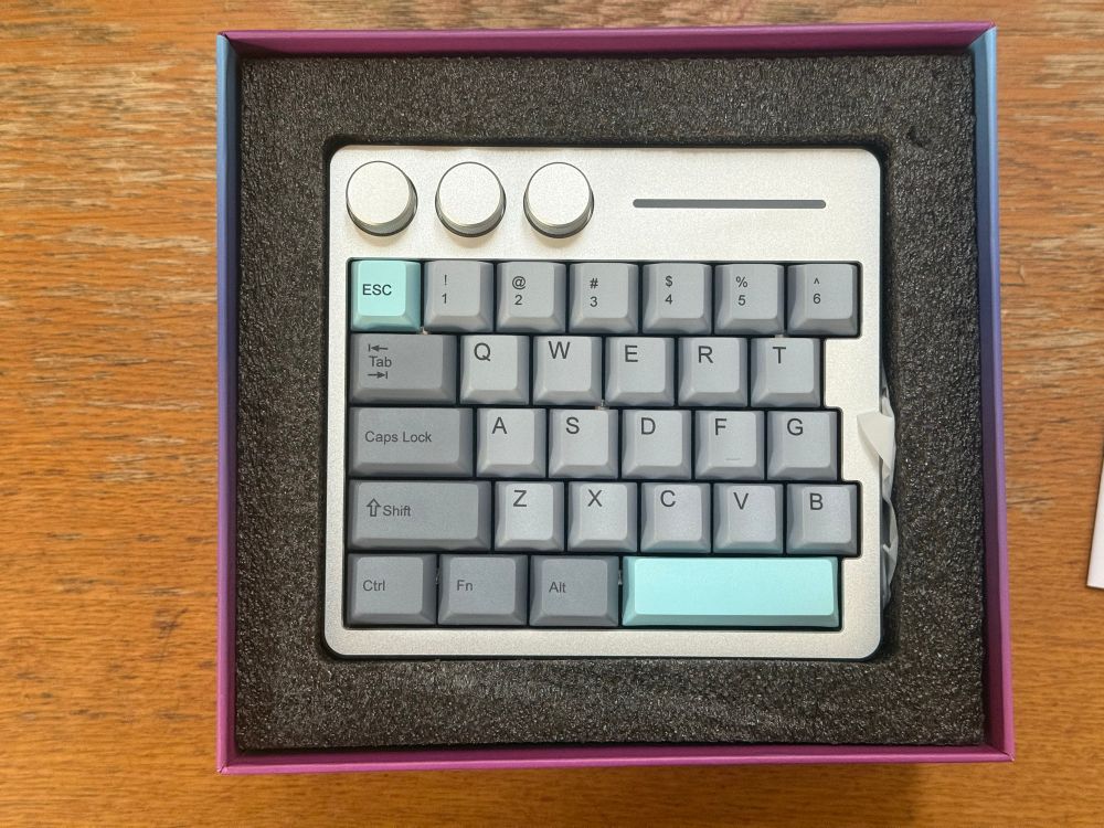 Actually half a keyboard cut off after 6 T G B with a half spacebar (3u) and three knobs. It’s clean and neat and compact, not much bigger than a standalone macro pad.