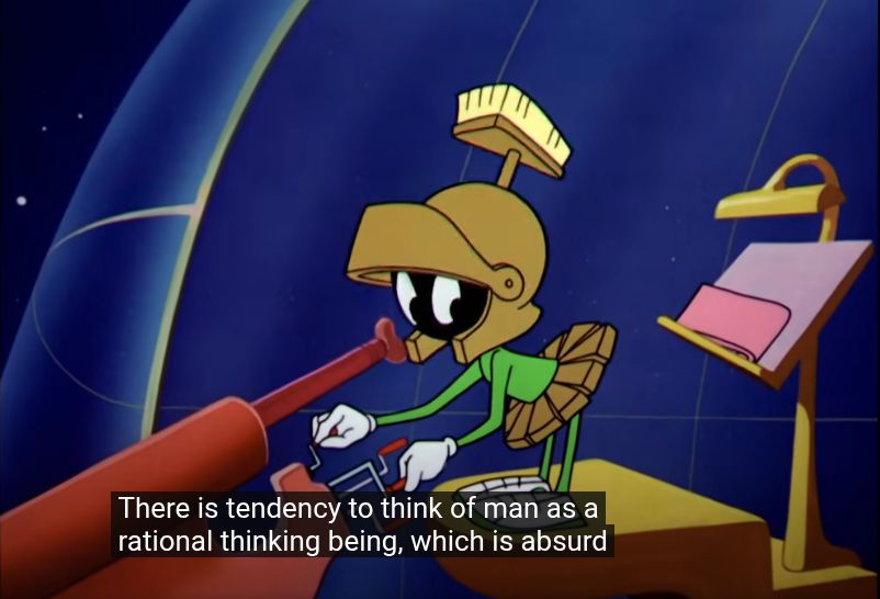 Animated scene featuring the Looney Tunes character Marvin the Martian inside a space observatory. He is looking through a red telescope, wearing his classic Roman soldier-style helmet and skirt. Behind him is a podium with pink and red papers. The background shows a starry sky with curved lines suggesting a glass dome. Subtitles at the bottom read, “There is tendency to think of man as a rational thinking being, which is absurd.”
