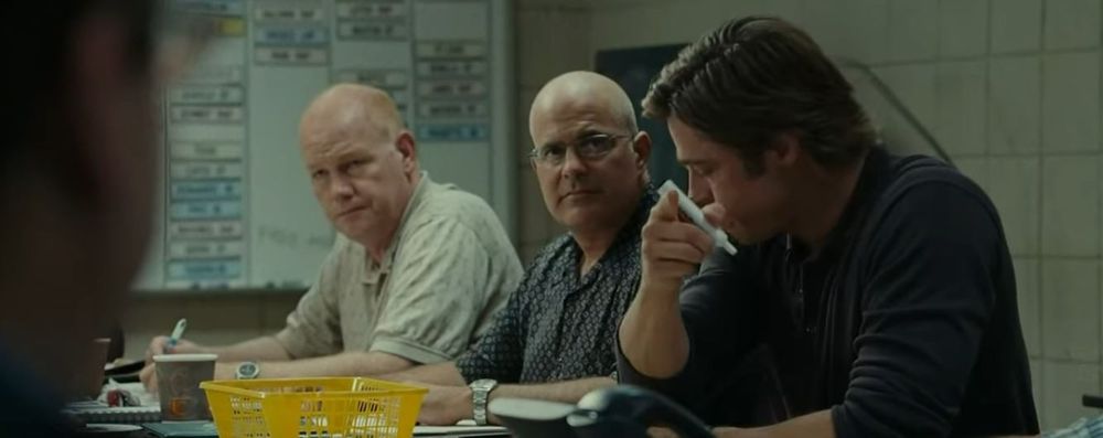 Still from Moneyball movie, Billy Beane pointing, which has the line "he gets on base" in the movie