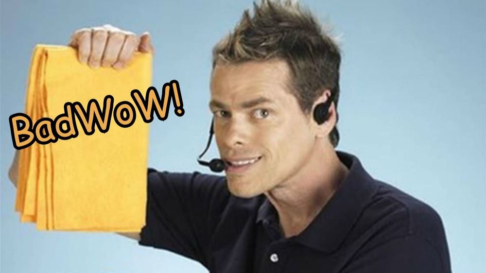 A thin man wearing a microphone headset, the former spokesman for the ShamWow, is holding a piece of yellow fabric that has been folded several times. The word BadWow has been added on the yellow fabric.
