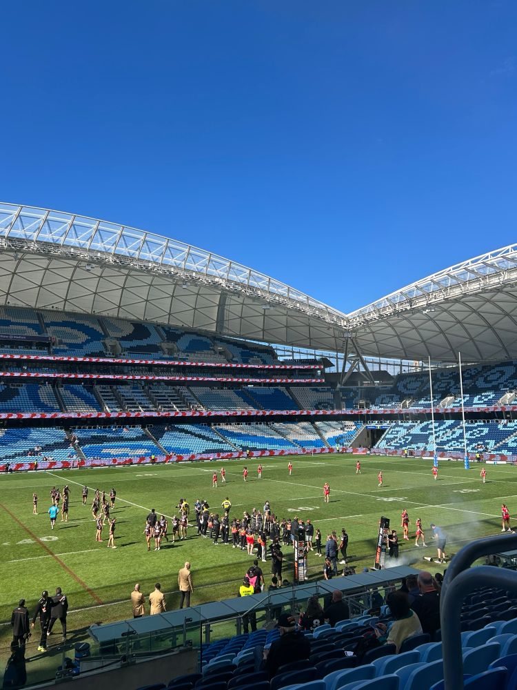 Tigers and Dragons NRLW teams running out at Allianz stadium at the start of a game 