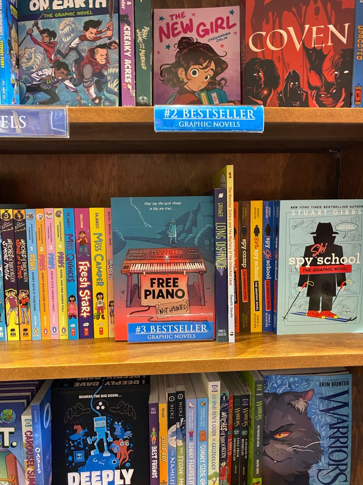 Free Piano on the shelves at Munro's Books, as the #3 bestseller in kids graphic novels