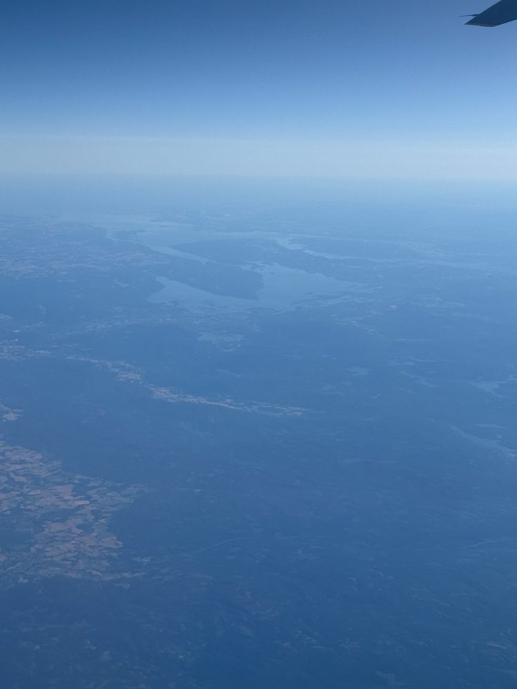 An airplane window photo of Oslo, Norway.