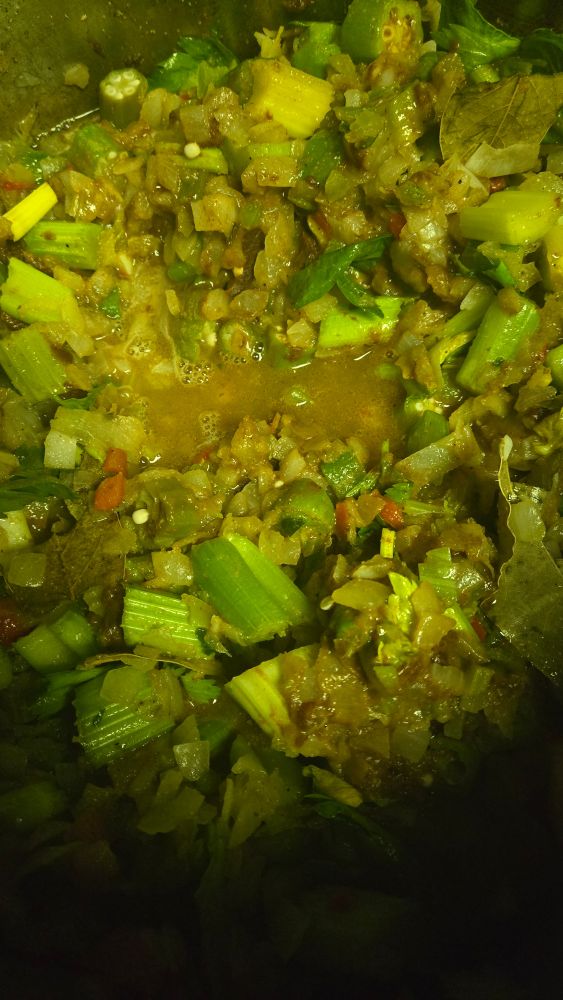Maybe you've never seen the veggies involved in gumbo, but here they are. 

Green. Onions. Leaves. Roux. 