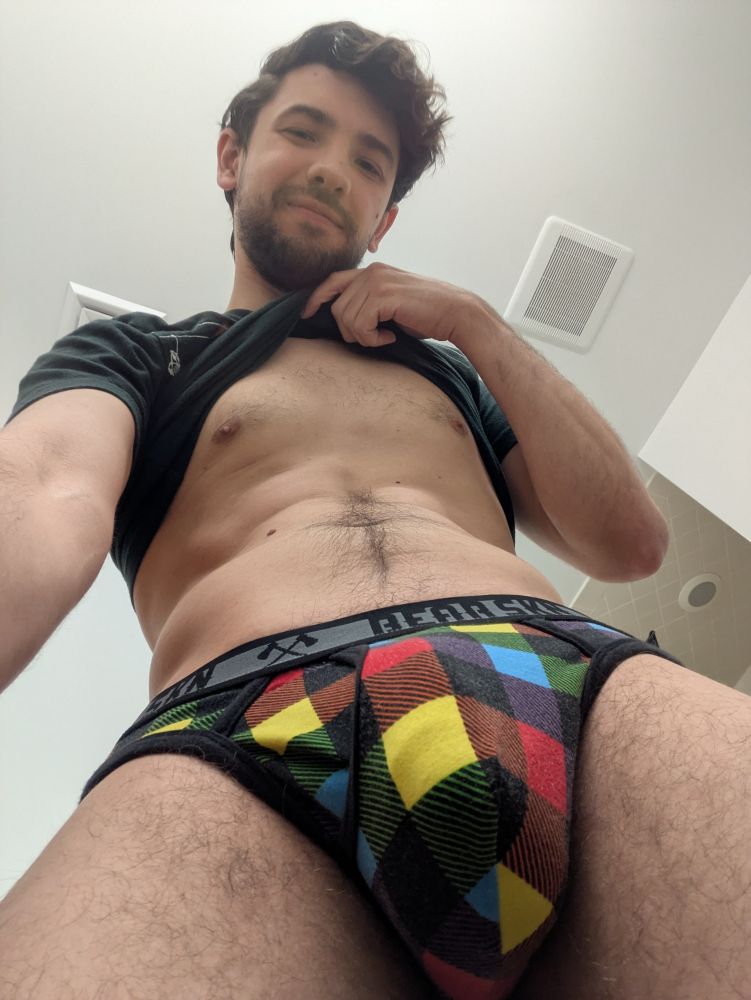 POV of me standing over you with my rainbow jockstrap close to your face