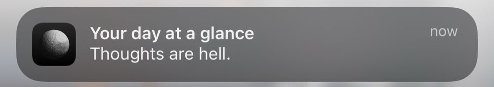 Screenshot of a push notification from the astrology app Costar. The notification reads, “Your day at a glance: Thoughts are hell.”