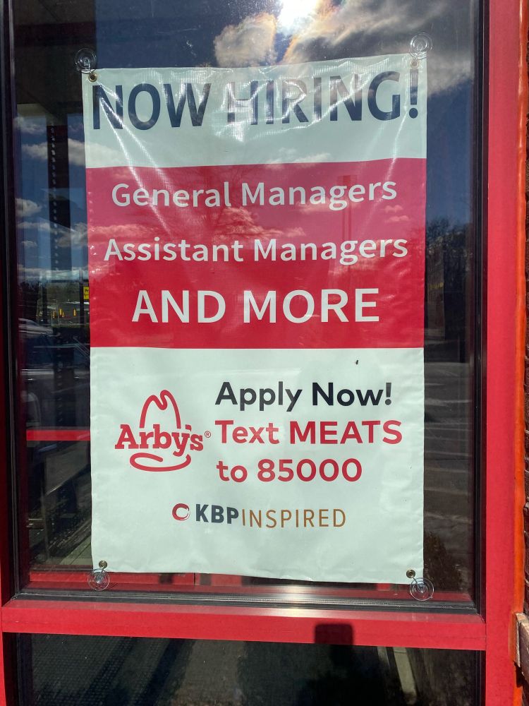 Sign at an Arby’s restaurant saying:
NOW HIRING!
General Managers
Assistant Managers
AND MORE
Apply Now!
Text MEATS
to 85000