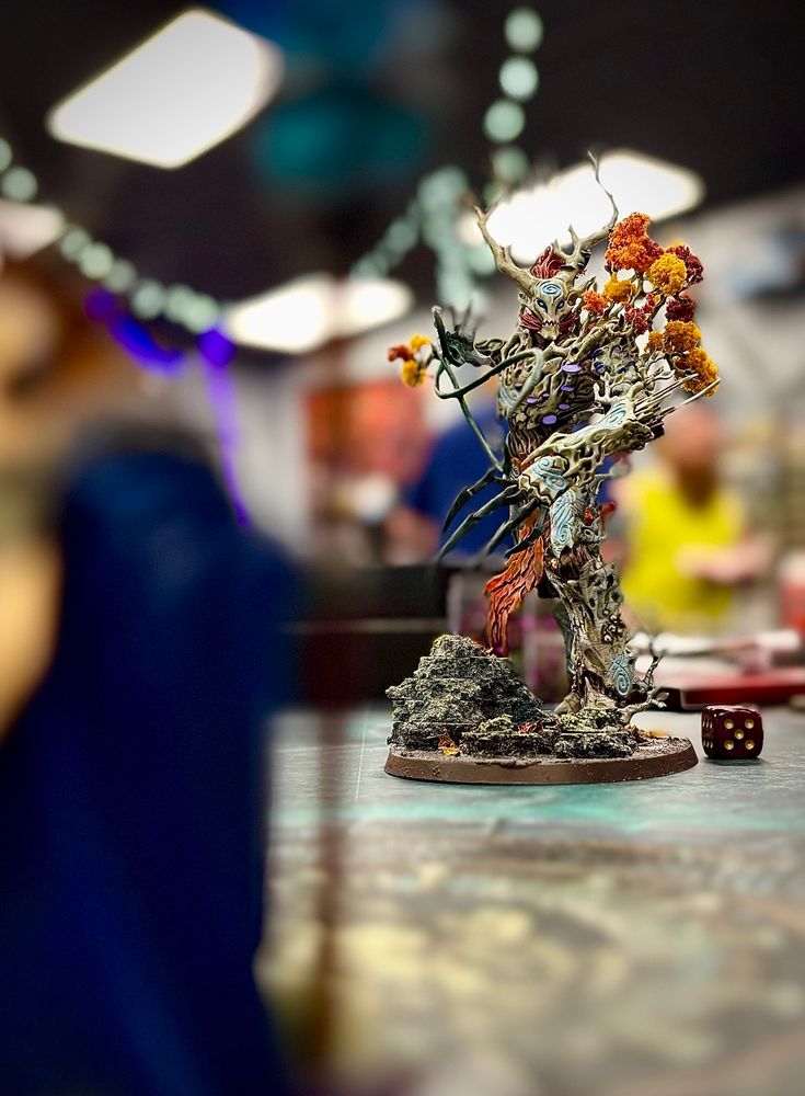 Lord Veritant telling a Treelord he “shall not pass”.  The Treelord did in fact pass. 

Blurry veritant in foreground with fully painted Sylvaneth Treelord in foreground. With dice next to it. 