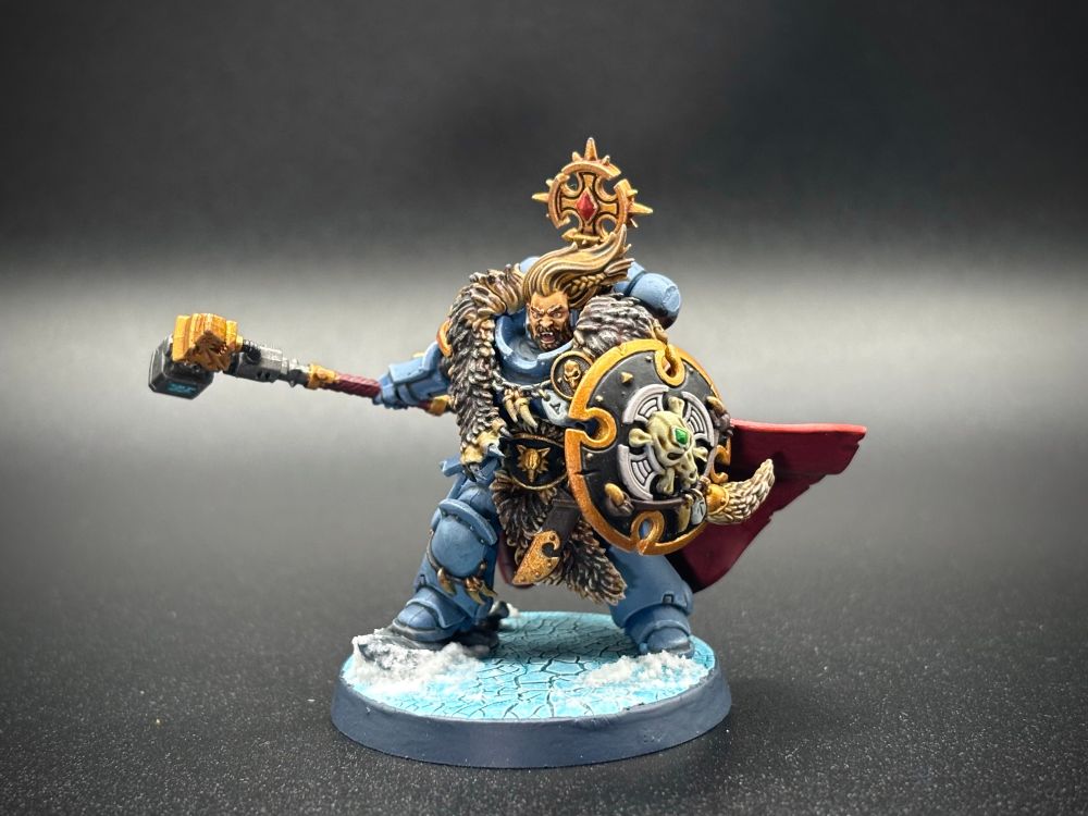 Wolf Guard Battle Leader mini painted on a black background. 