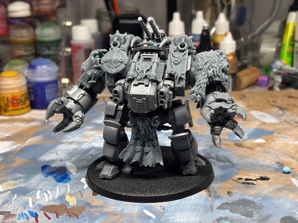 Unpainted Brutalis Dreadnought with Grey tide studios 3d printed bits attached.