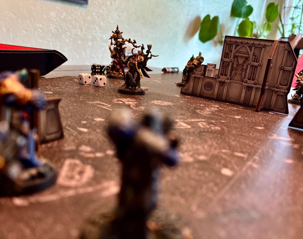 Plague marine mini in background with ultra marine min in blurry foreground. 