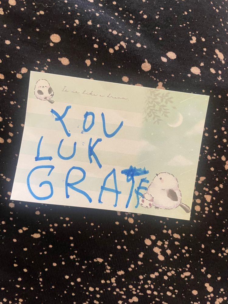 Note from six-year-old that says “YOU LUK GRATE”