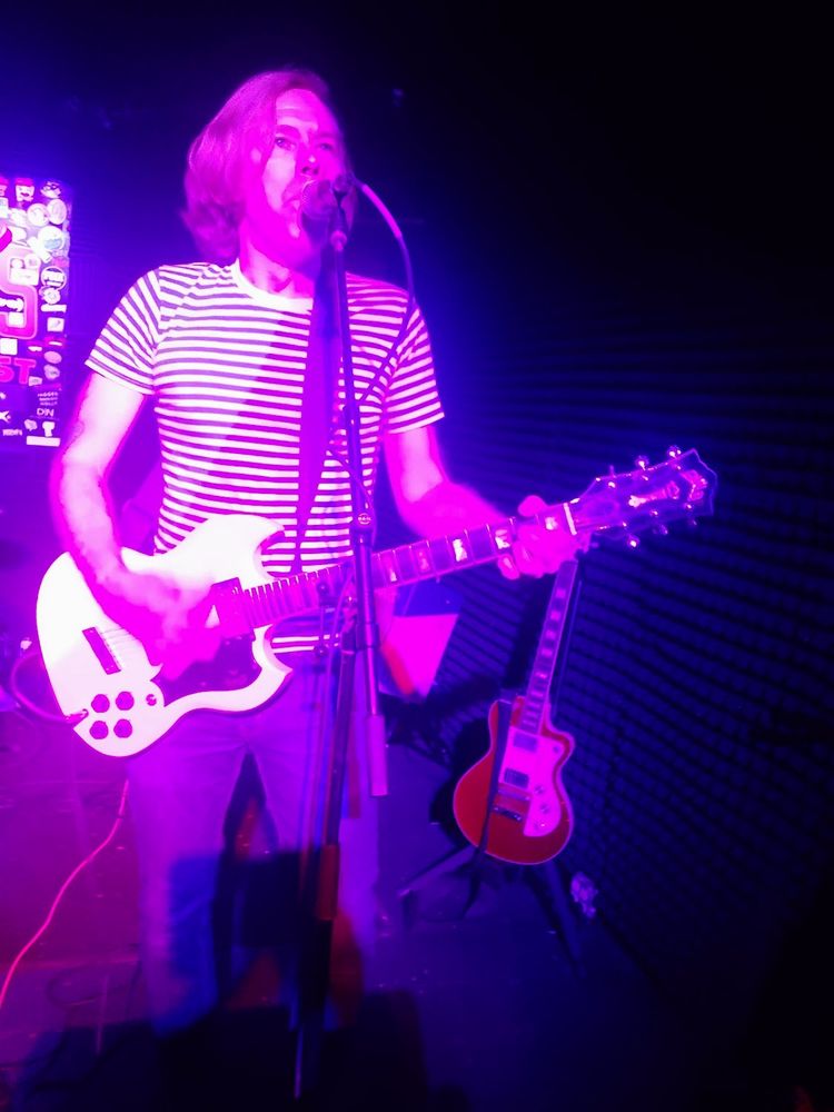 Galen playing guitar