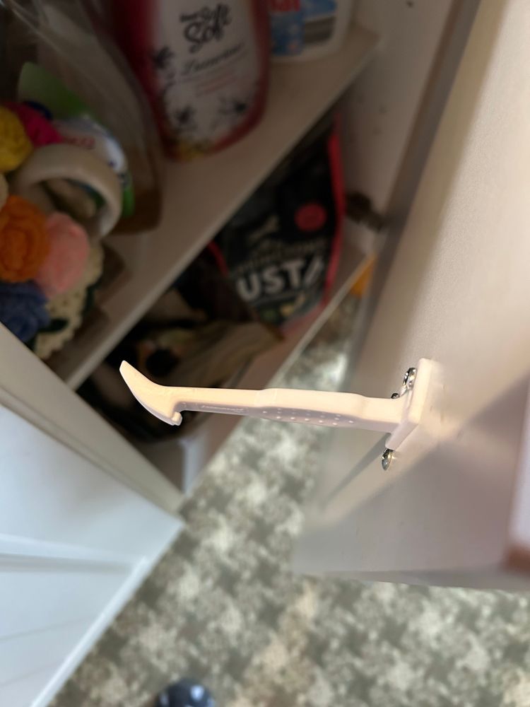 Child lock installed on the dog food cupboard 