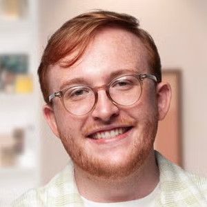 Bradley, with red hair and a beard.