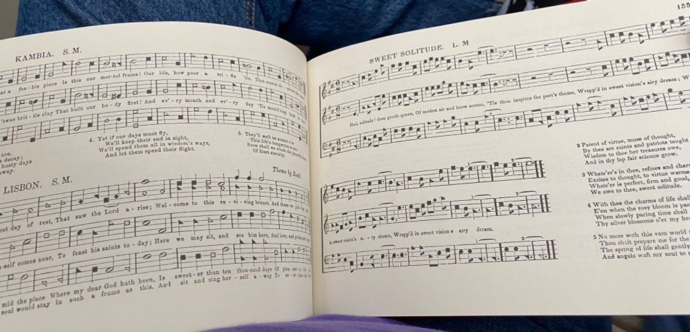Picture of a page from Walker’s “Southern Harmony,” showing the tunes “Kambia,” “Lisbon,” and “Sweet Solitude”