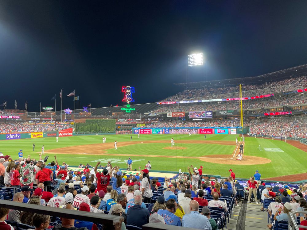A view from the third base side of the Phillies warming up. Cristopher Sánchez on the mound. 