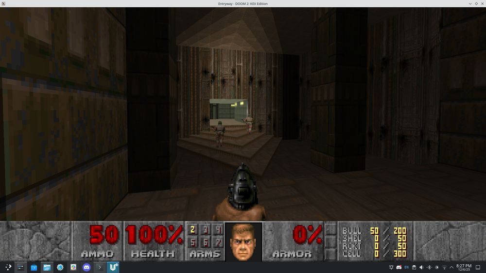 A screenshot of Debian showing the source port UZDoom playing Doom 2.