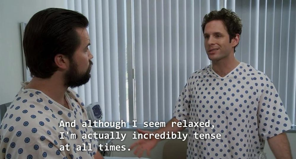 Always Sunny screenshot. Mac and Dennis in hospital gowns. Text "And although I seem relaxed I'm actually incredibly tense at all times."