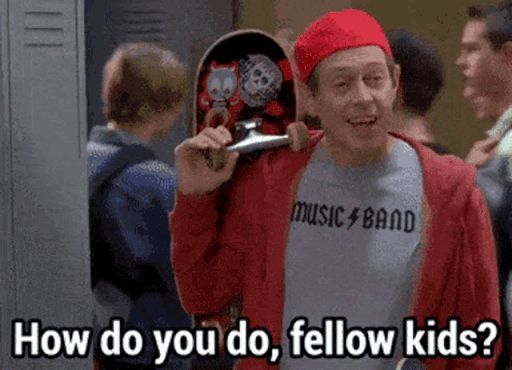 Steve Buscemi approaches a group of high school students while wearing a baseball cap and carrying a skateboard and says "how do you do, fellow kids?". 
