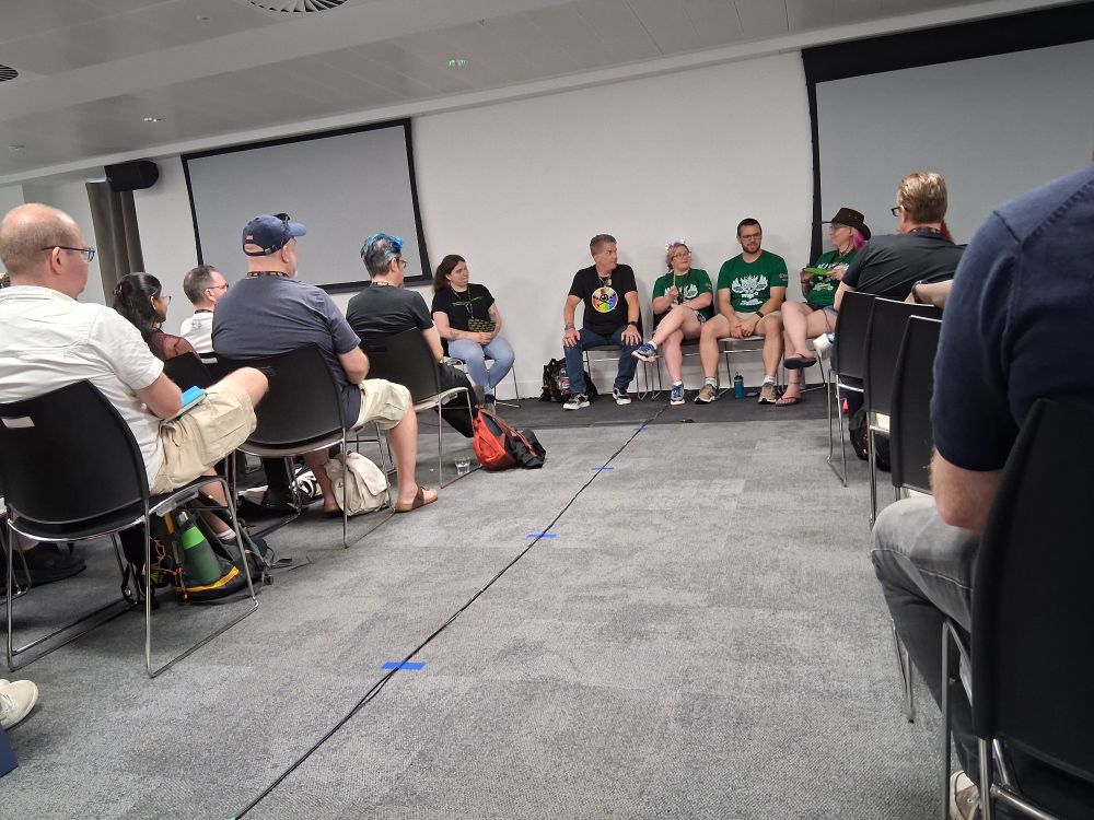 Photo of the final panel session at bSides Leeds, showing all bar one of the panelists.
